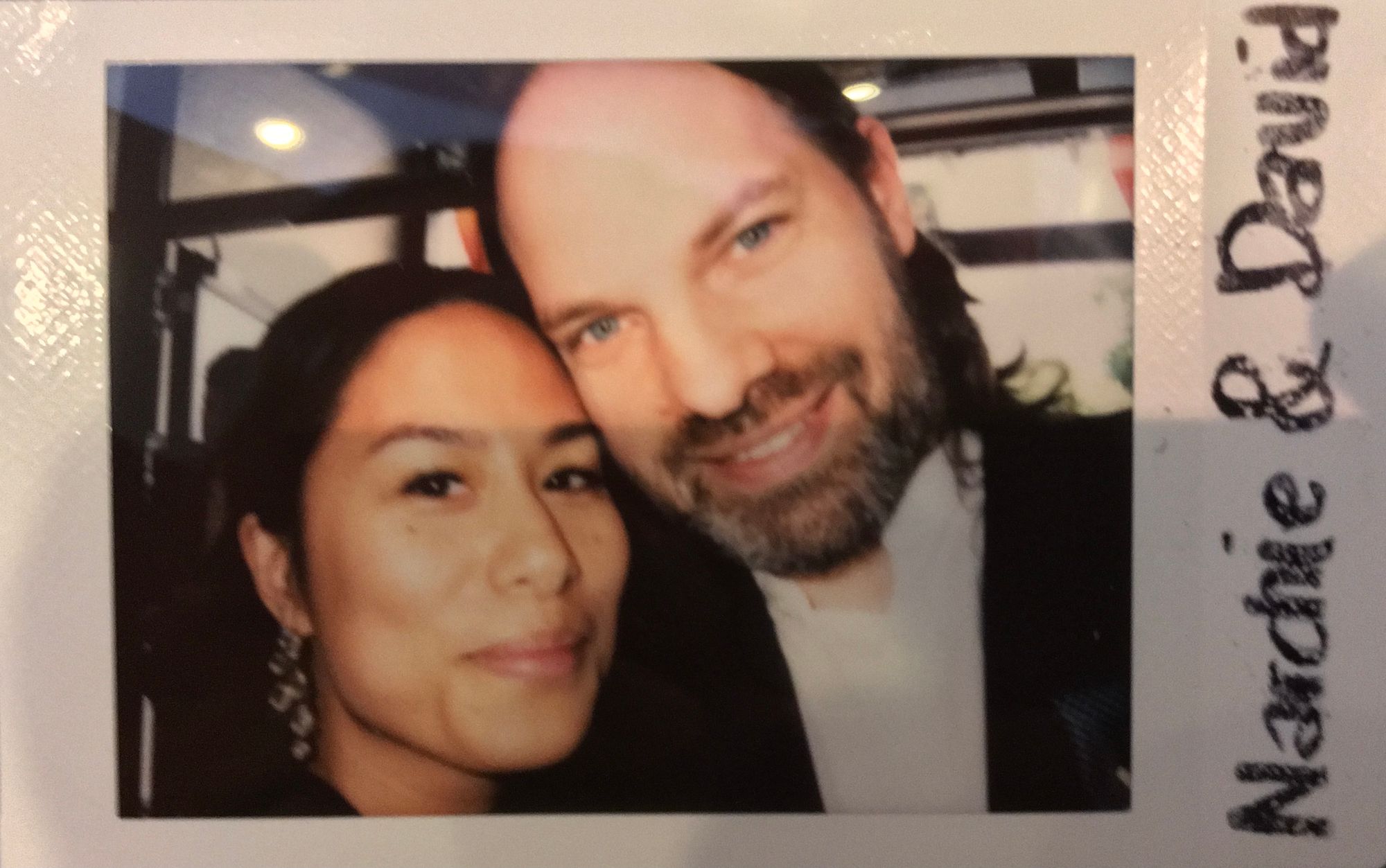 Polaroid photo of us at a wedding.